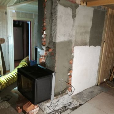Mur og Flisconsult restaurerer gammelt ildsted